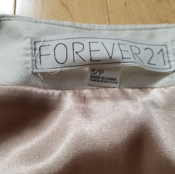 Forever 21 laser cut cream mini skirt - Picture 2 of 2